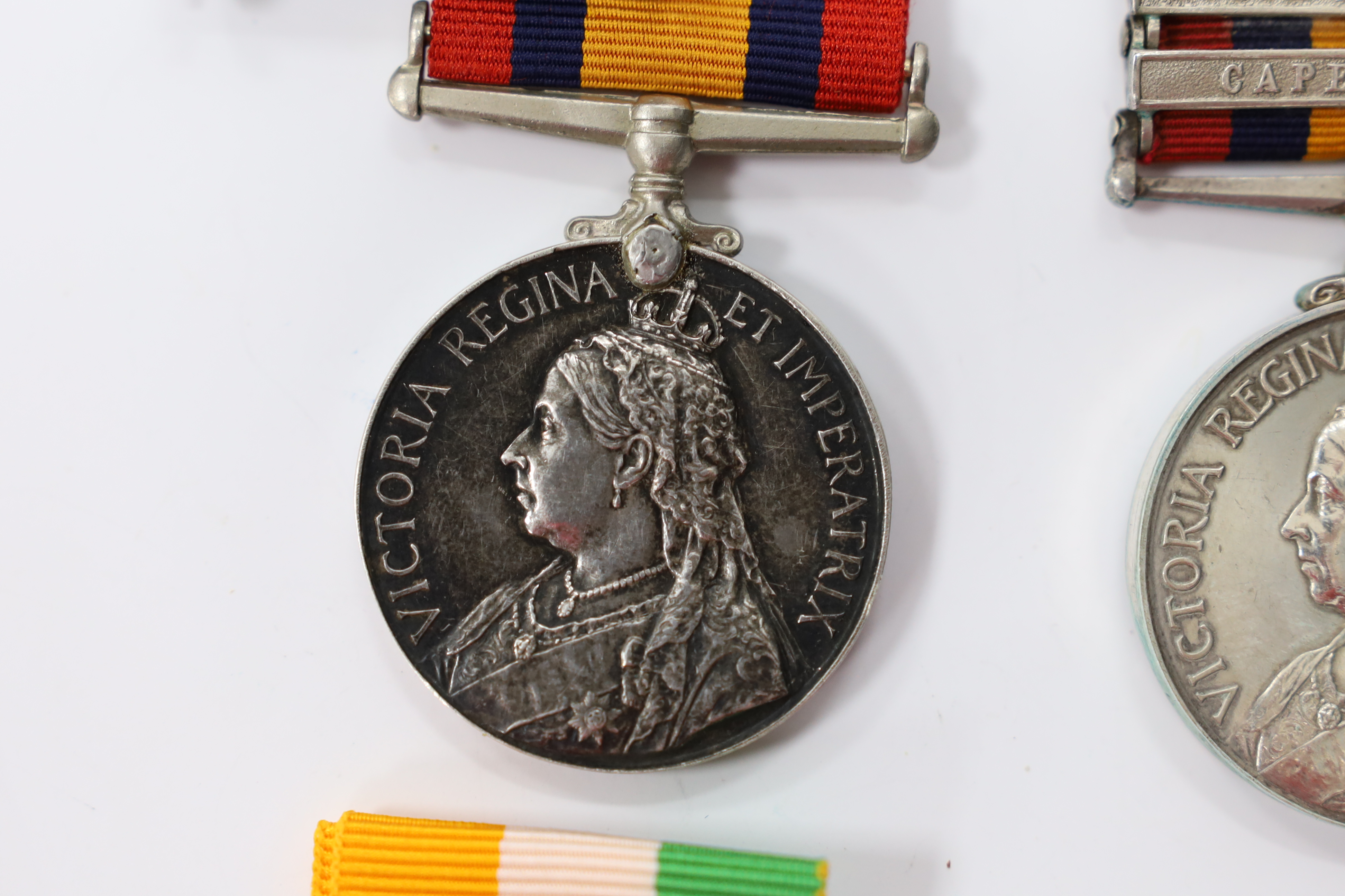 Assorted medals; two replica British North Borneo medals; Balaklava medallion; bronze GV medal; German China Campaign medal; bronze NRA medallion, unnamed